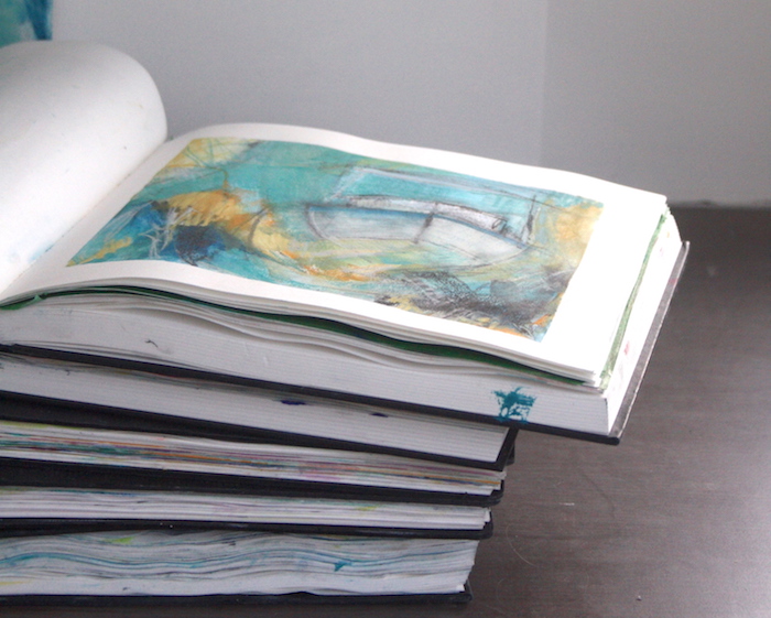 stack of sketchbooks